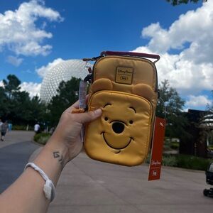 Disney Exclusive winnie the pooh lug cross body